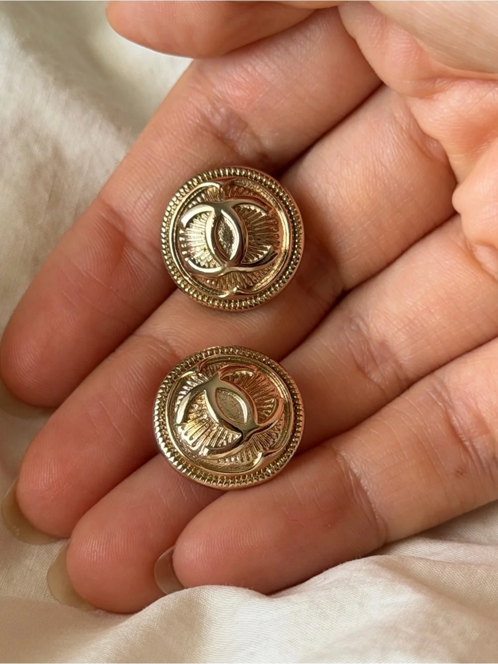 CHANEL Gold Round Interlocking CC Button Earrings